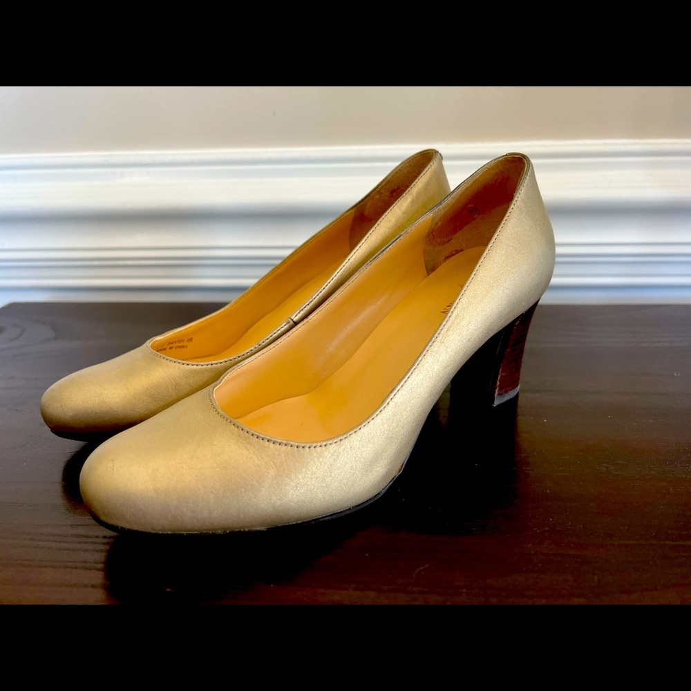 Gold Cole Haan heels.